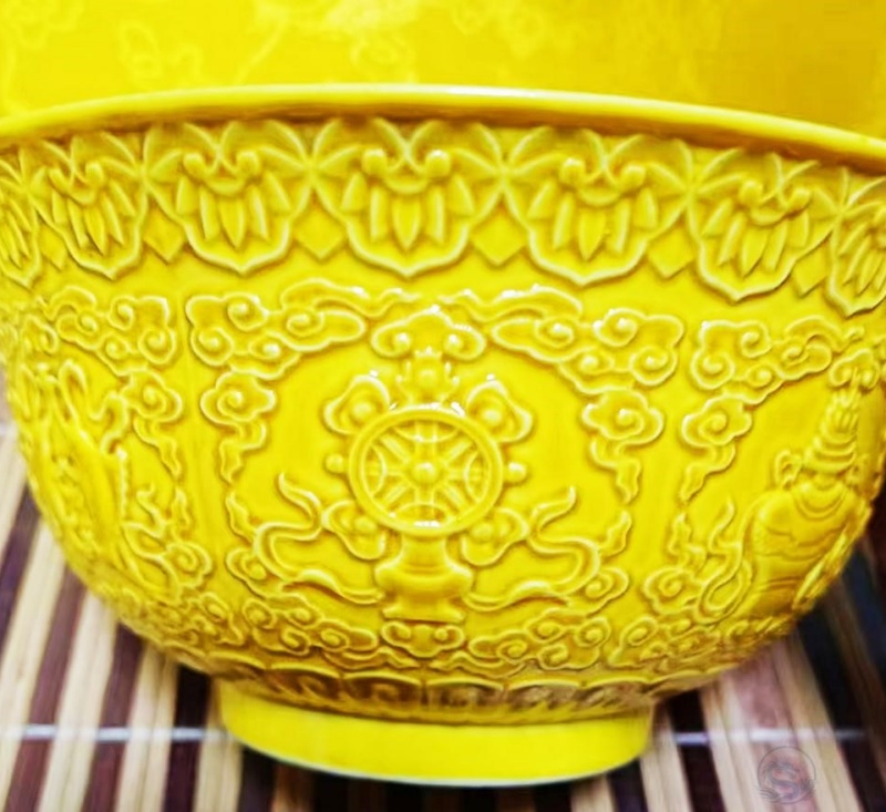 御制黄釉 佛光宝相:清雍正黄釉浮雕碗的三重价值解析