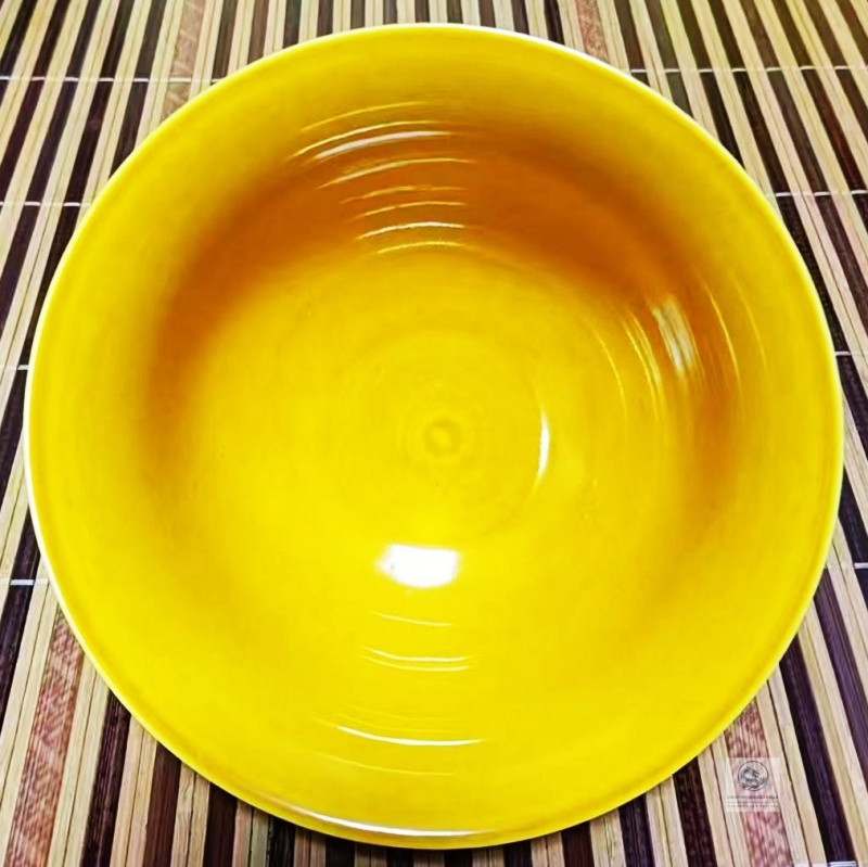 御制黄釉 佛光宝相:清雍正黄釉浮雕碗的三重价值解析